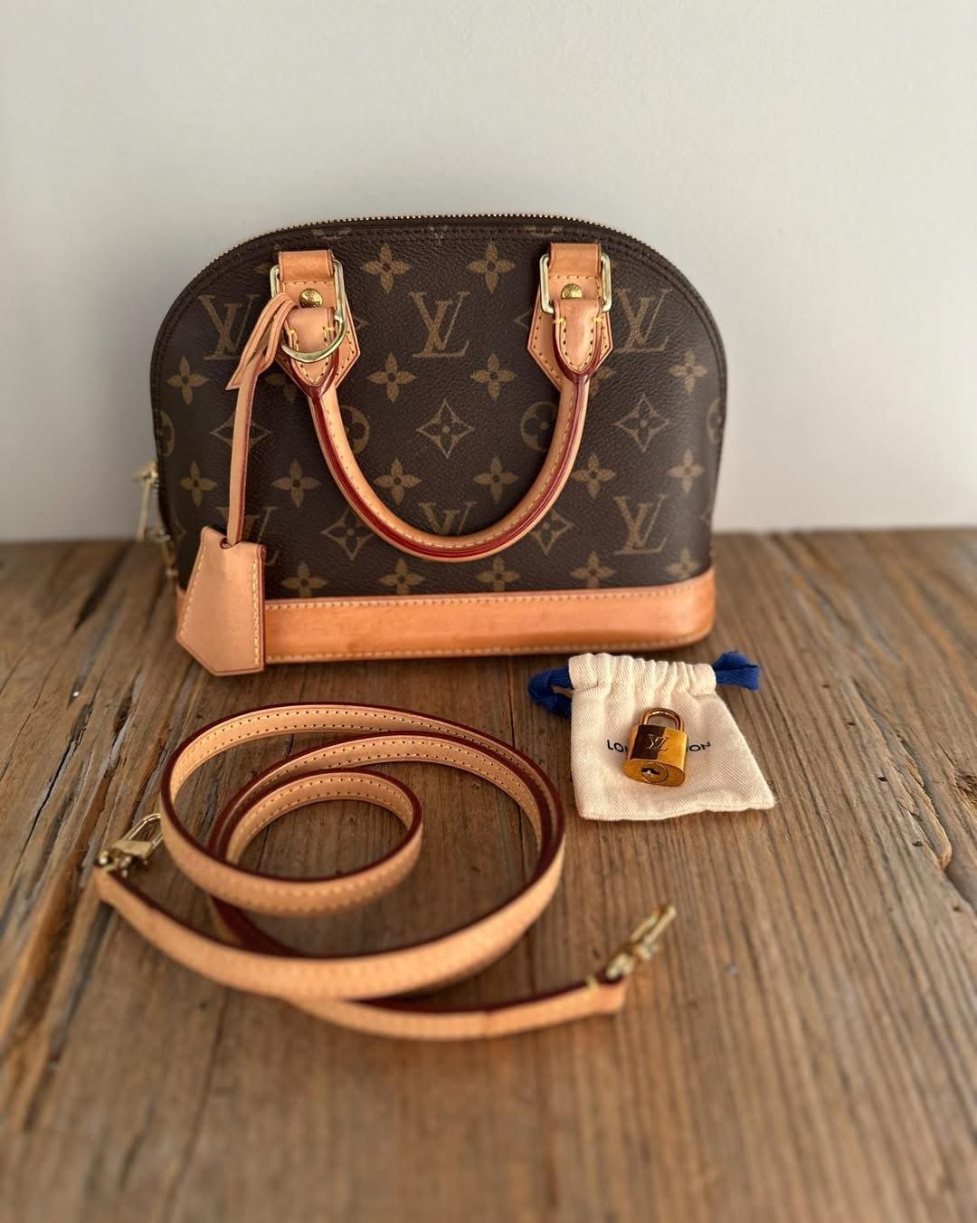 Louis Vuitton Alma BB leather handbag Never worn Brown, Leather