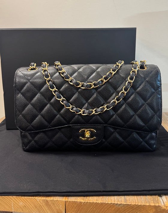 Chanel Large Classic Double Flap in Black Caviar